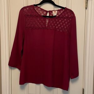 Women’s burgundy blouse